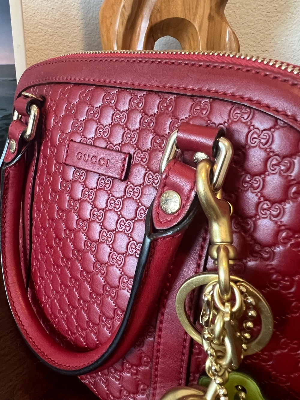 Gucci Red Embossed Leather Bag with Gold-Tone Charm